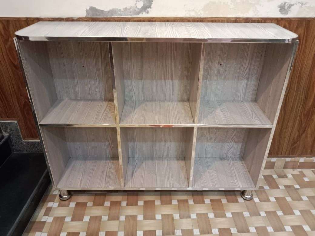Storage shelf for books and crockery