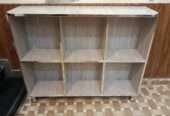 Storage shelf for books and crockery