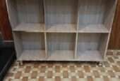 Storage shelf for books and crockery