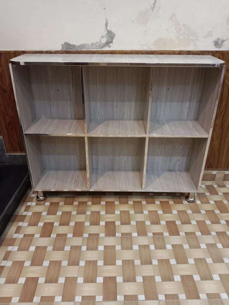 Storage shelf for books and crockery