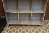 Storage shelf for books and crockery