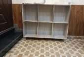 Storage shelf for books and crockery