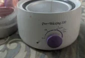 Electronic wax machine