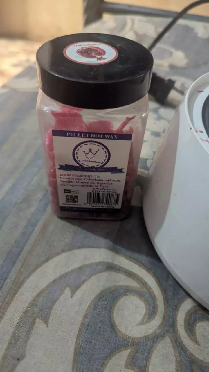 Electronic wax machine