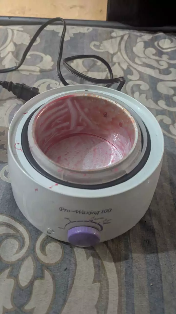Electronic wax machine