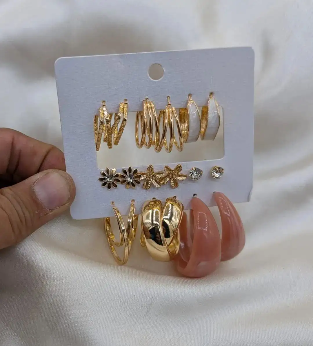 9 pair of earrings, FD