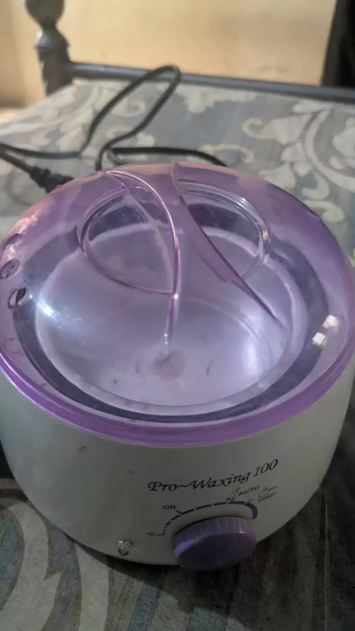 Electronic wax machine