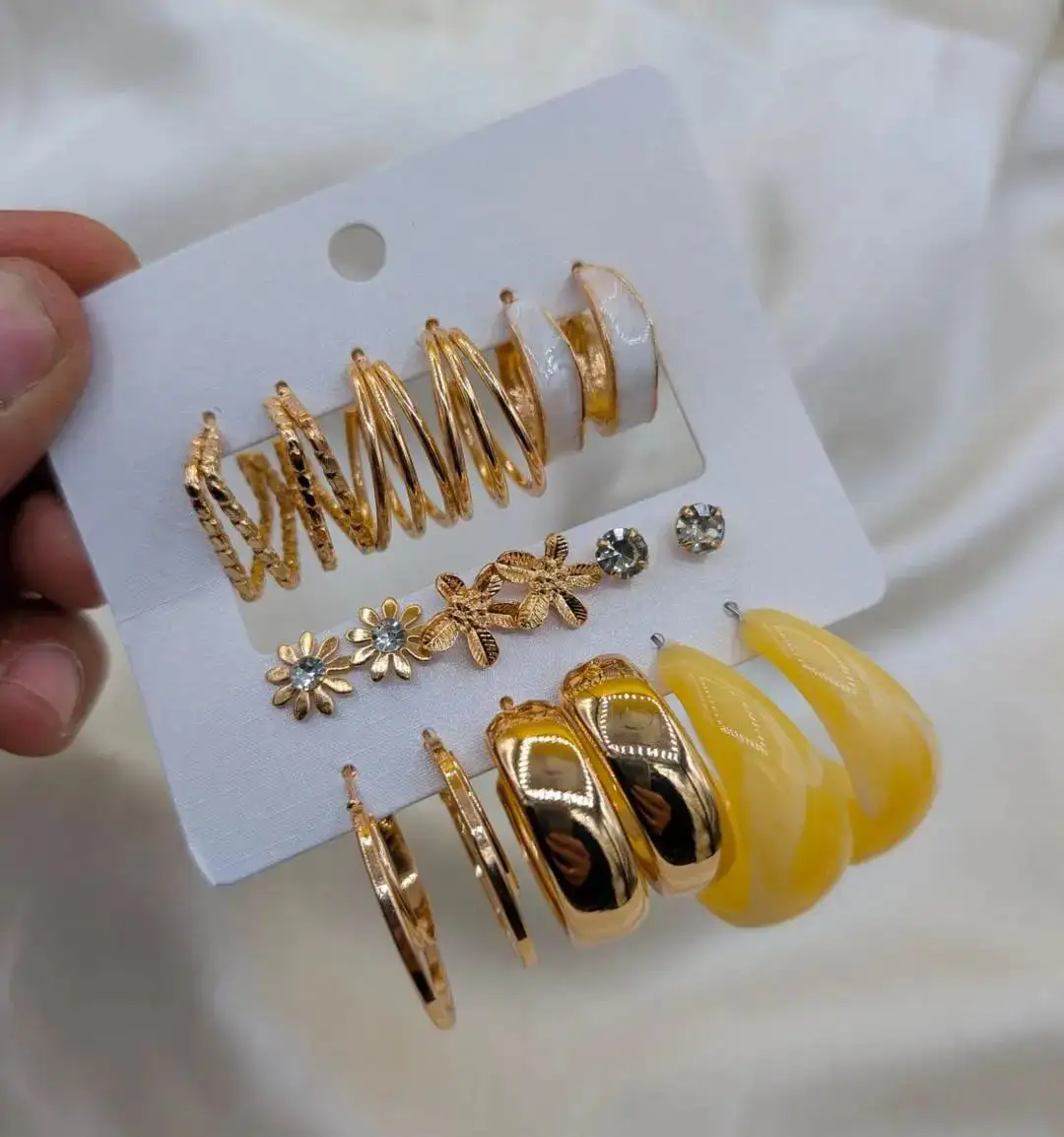 9 pair of earrings, FD