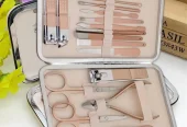 Beige Travel Manicure kit with 12 tools.
