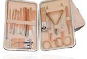 Beige Travel Manicure kit with 12 tools.