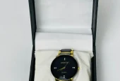 Men’s black gold stainless steel analog watch