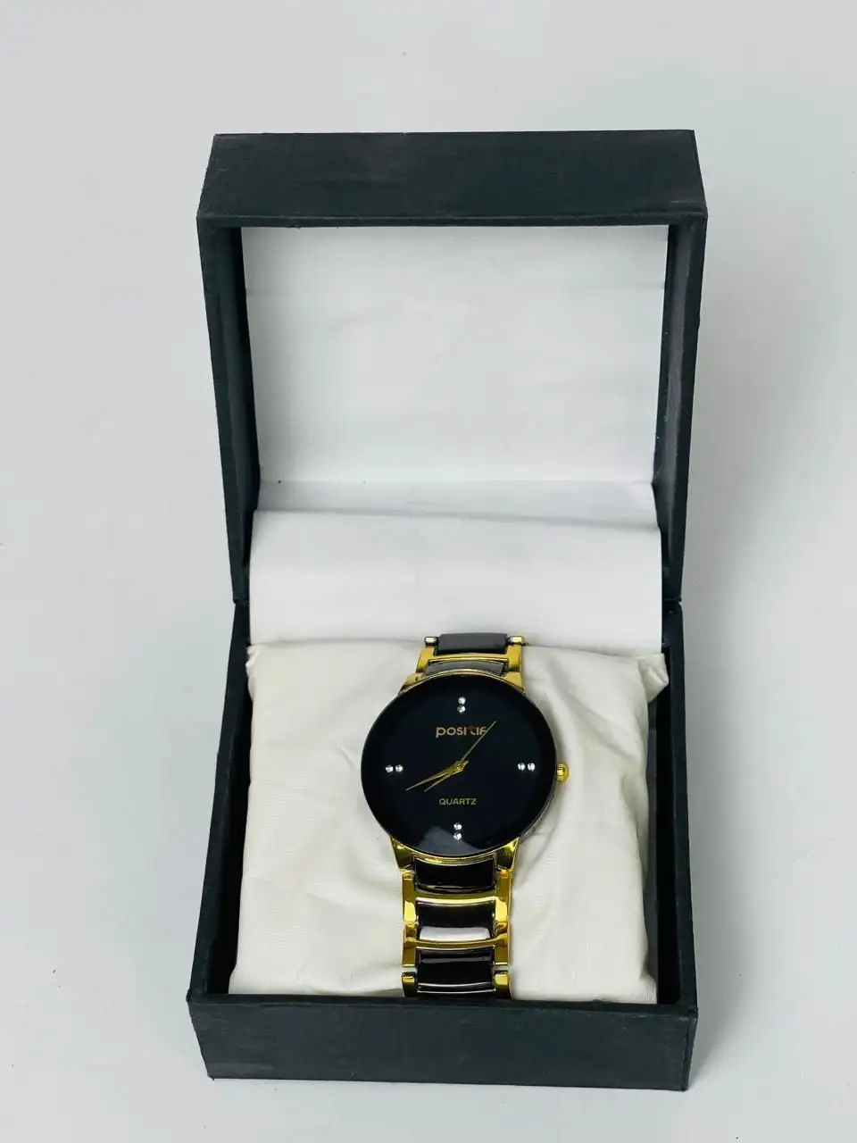 Men’s black gold stainless steel analog watch