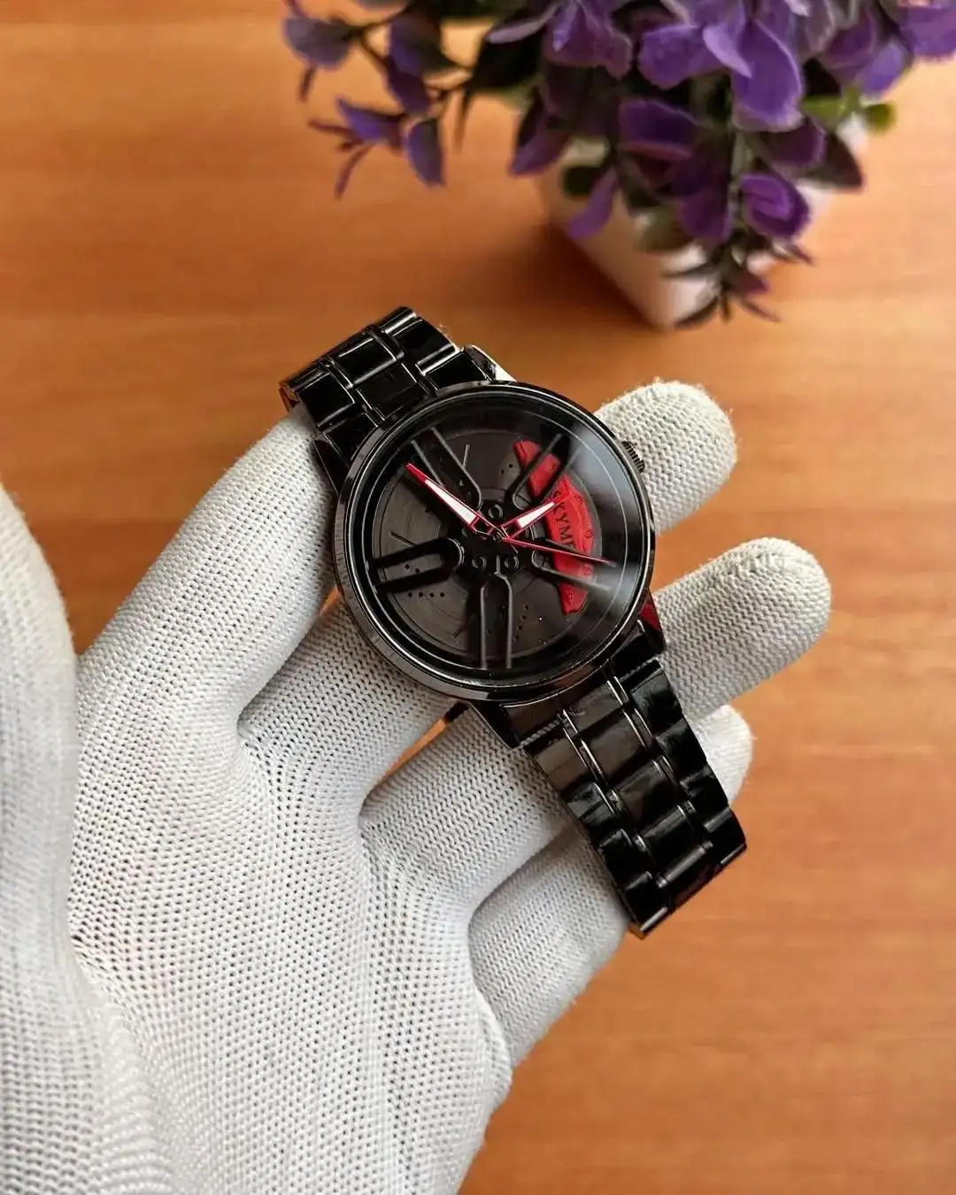 Spinning watch blue dial black strap multicolour