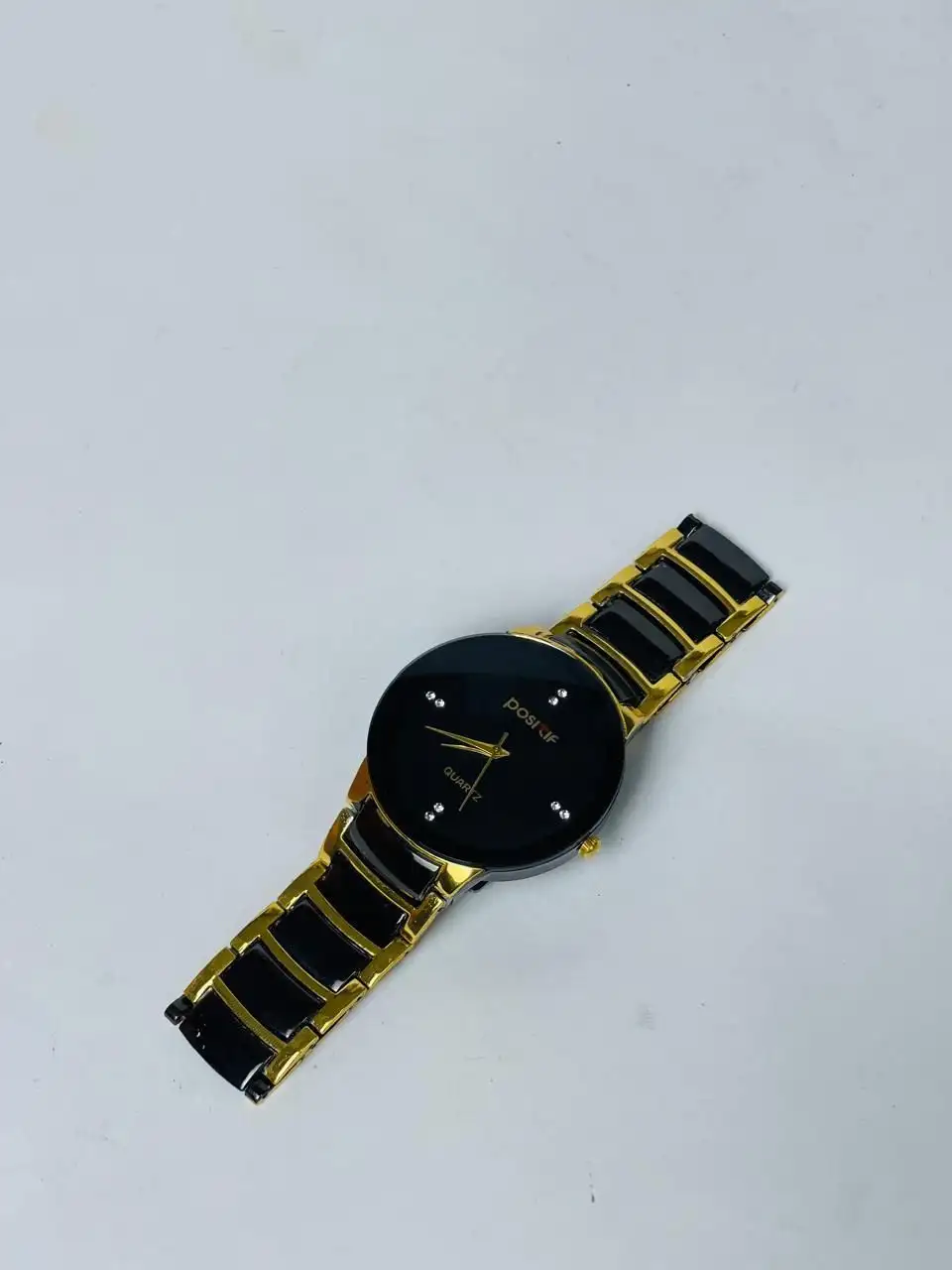 Men’s black gold stainless steel analog watch