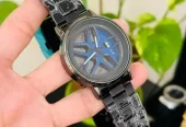 Spinning watch blue dial black strap multicolour
