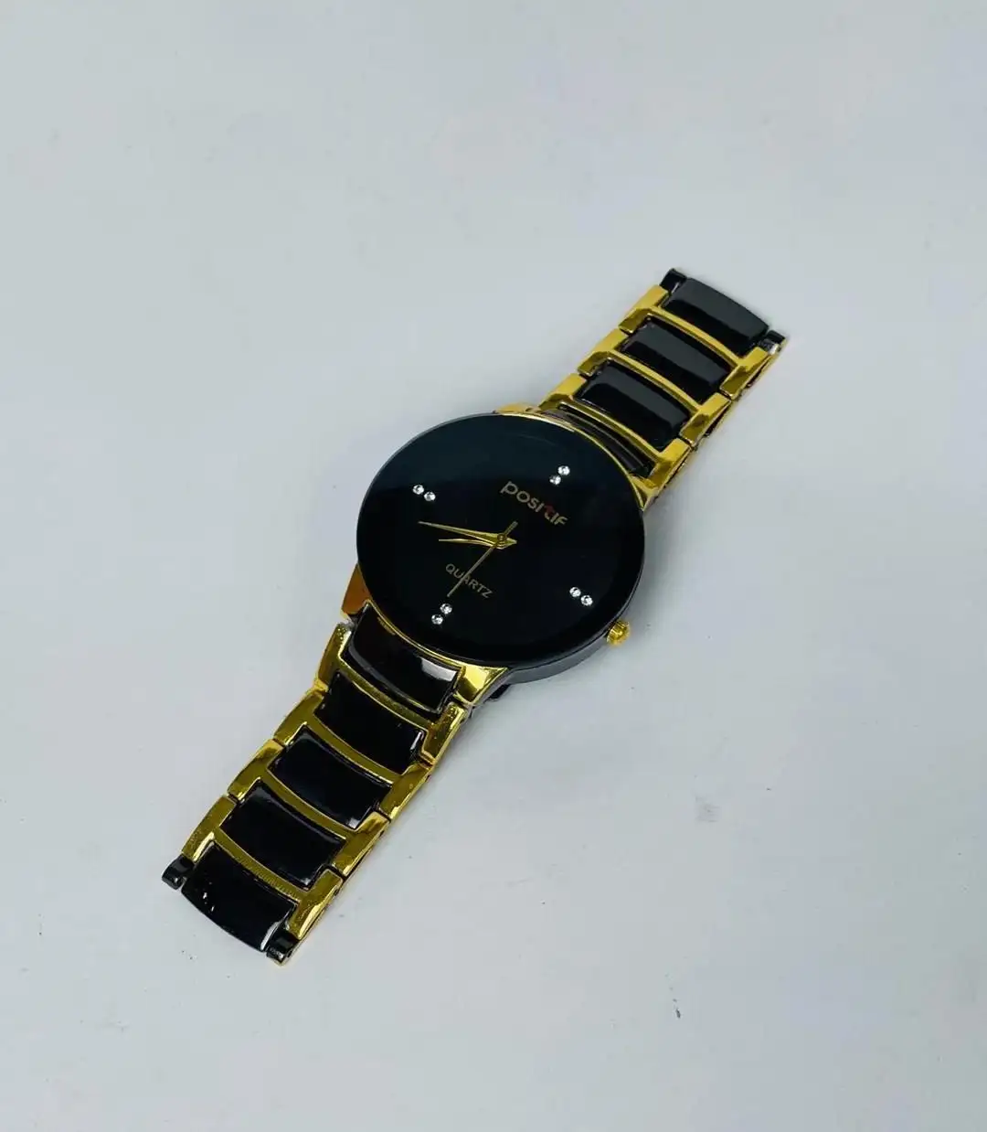 Men’s black gold stainless steel analog watch