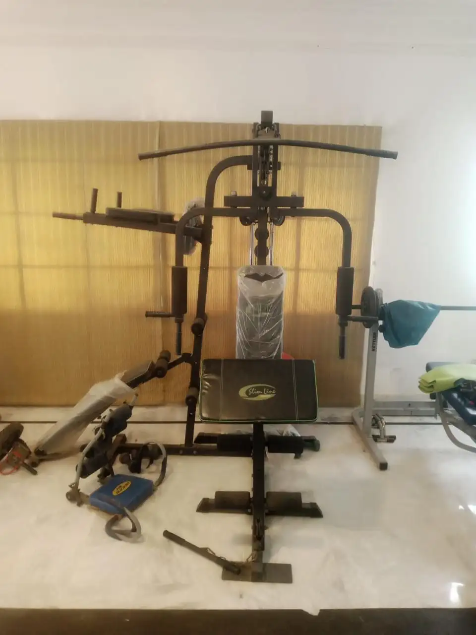 Gym all machines , stands and weights / plates and dumbells 4. 5lacs( Kettler machines)